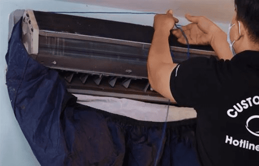 treo võng hứng nước bẩn khi vệ sinh điều hoà