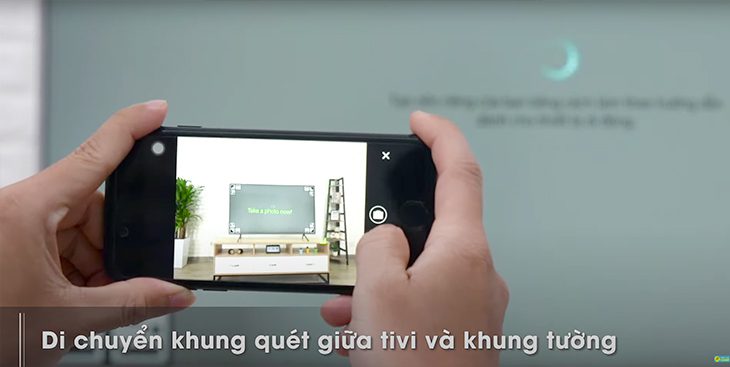 Nhấn nút chụp khi khung viền màu xanh hiện lên.