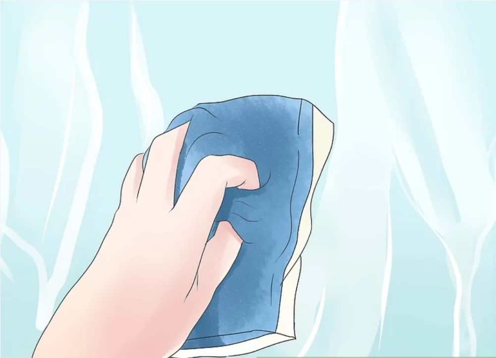 Cách tẩy vết mực trong lồng máy sấy - Dùng bọt biển Magic Eraser