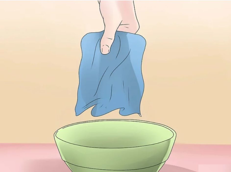 Sử dụng xà phòng rửa bát để tẩy vết mực trong lồng máy sấy