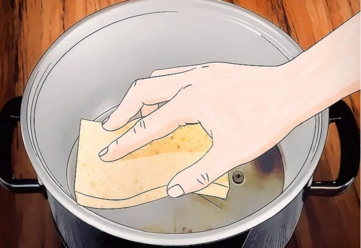 Vệ sinh phần nồi nấu bên ngoài