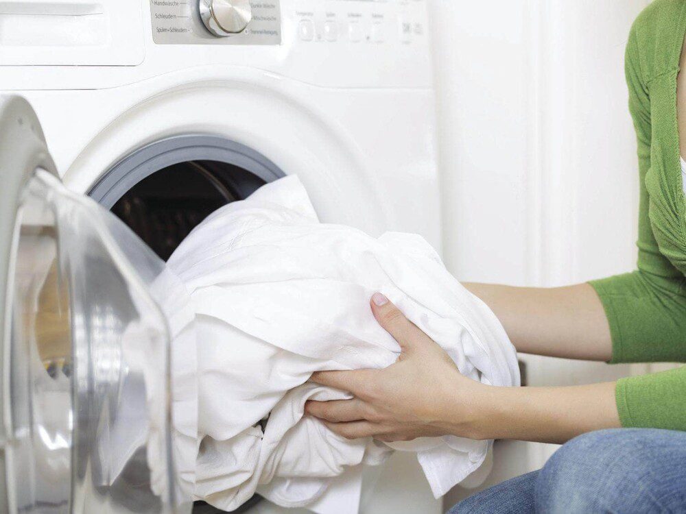 Cách giặt ga trải giường mới mua về