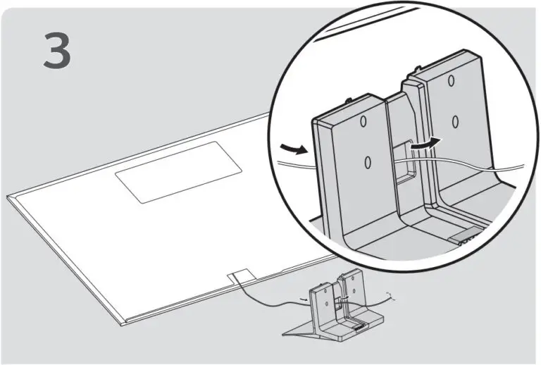 Luồn dây điện qua ô vuông của chân đến tivi 