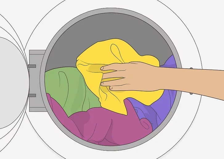 Bước 1: Bỏ quần áo ướt của bạn vào máy sấy